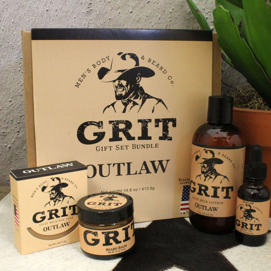 Grit Outlaw gift set bundle with bottles, jar, and box on a textured surface.