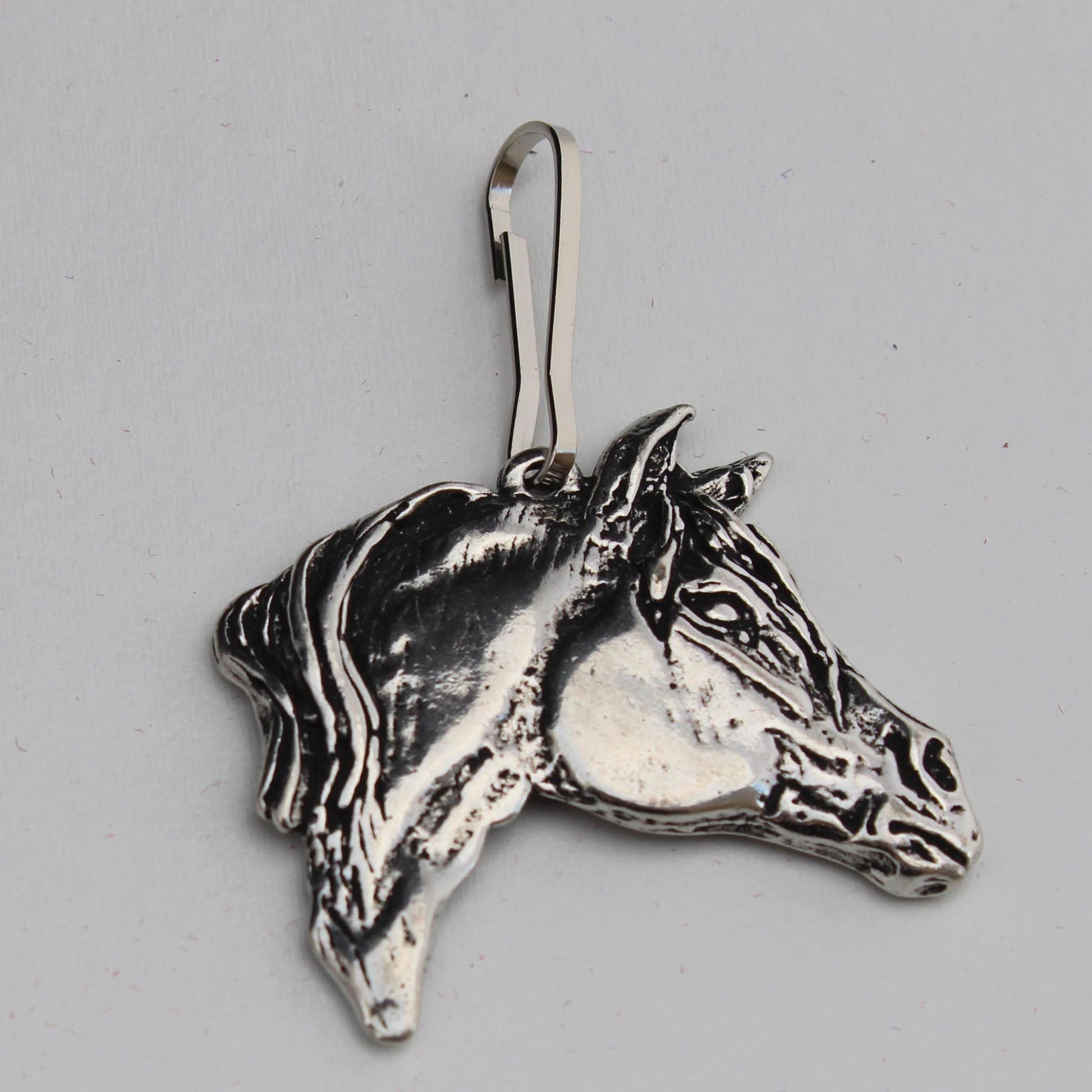 Add a little western charm to your purse or jacket. Great for any horse lover. 