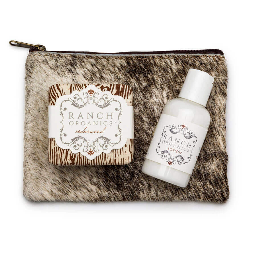 Ranch Organics soap and lotion set on a fur-textured pouch