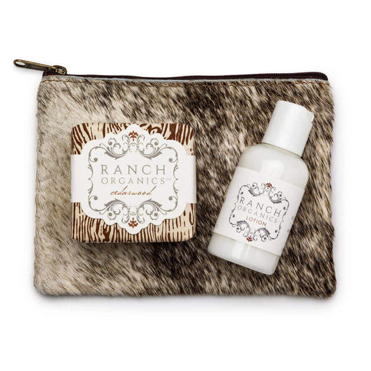 Ranch Organics soap and lotion set on a fur-textured pouch