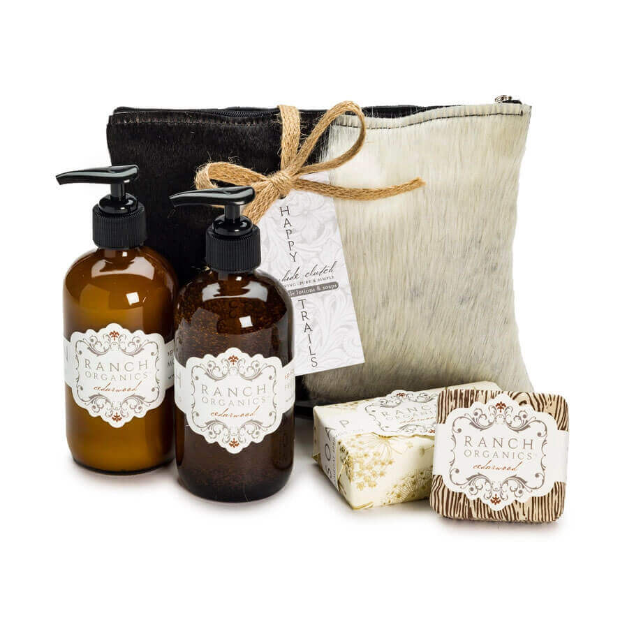 Set of Ranch Organics products including bottles, soap, and a pouch on a white background