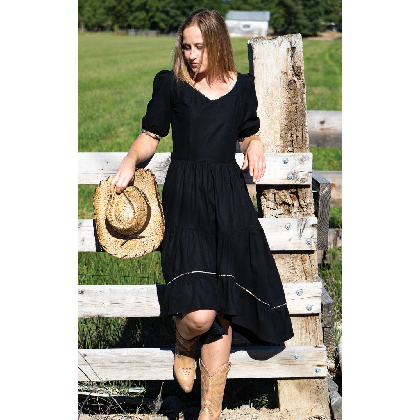 Wondering what to wear with your favorite cowgirl boots? The High Desert Princess Dress is perfect for many occasions. Three fabric tiers descend to a high-low hemline with accent trim, pockets and a zipper closure. Has a nice open neckline to highlight your jewelry. Dress comes with a detachable fabric belt that can be tied in the back for a little bit of country or style it with a cowgirl Concho belt for a little bit of rock-n-roll. 100% Cotton Made in USA.