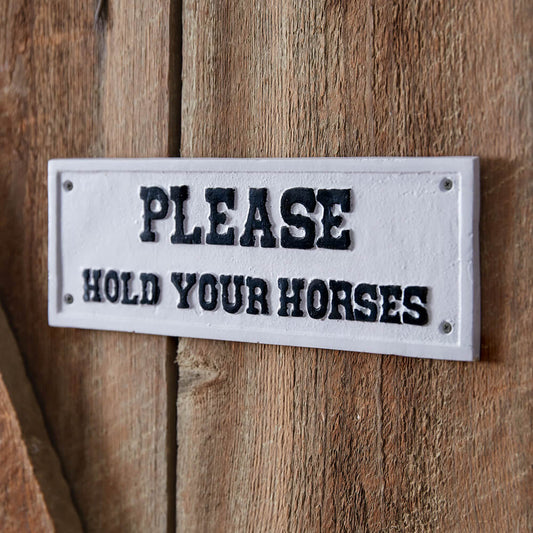 This comical Western sign will bring laughter to all who read it. Sign is crafted from cast iron. To hang, use its four screw-hole hangers. Heavy Duty. Made of cast iron. Measurement: 10¾''W x 4''H