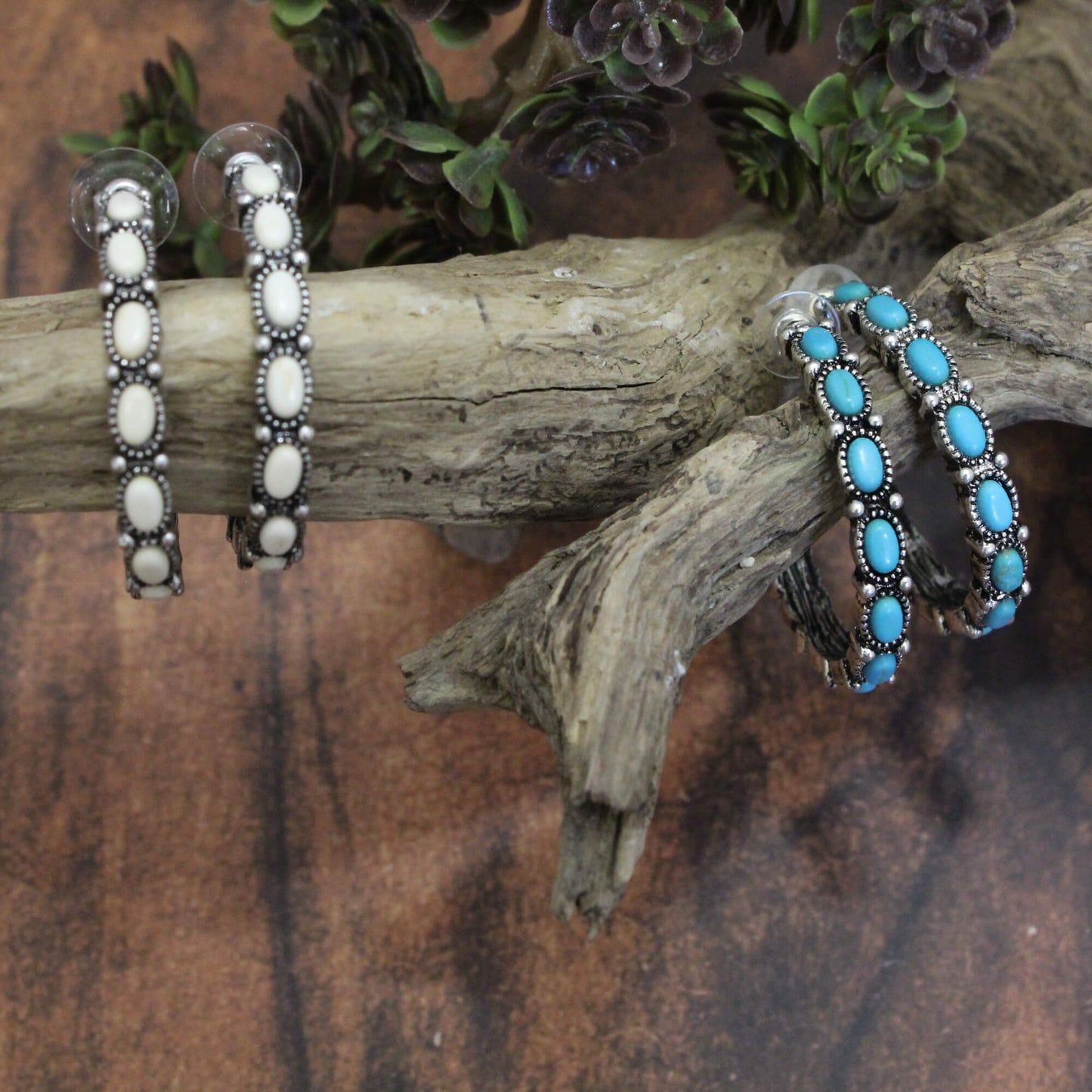 Semi-Precious Inlayed Turquoise or White Stone Hoop Earrings are a beautiful and bold accessory for any outfit or occasion. Unique turquoise stone inlay setting of a studded silver half hoop. Great gift idea! Approximately 1-1/2".