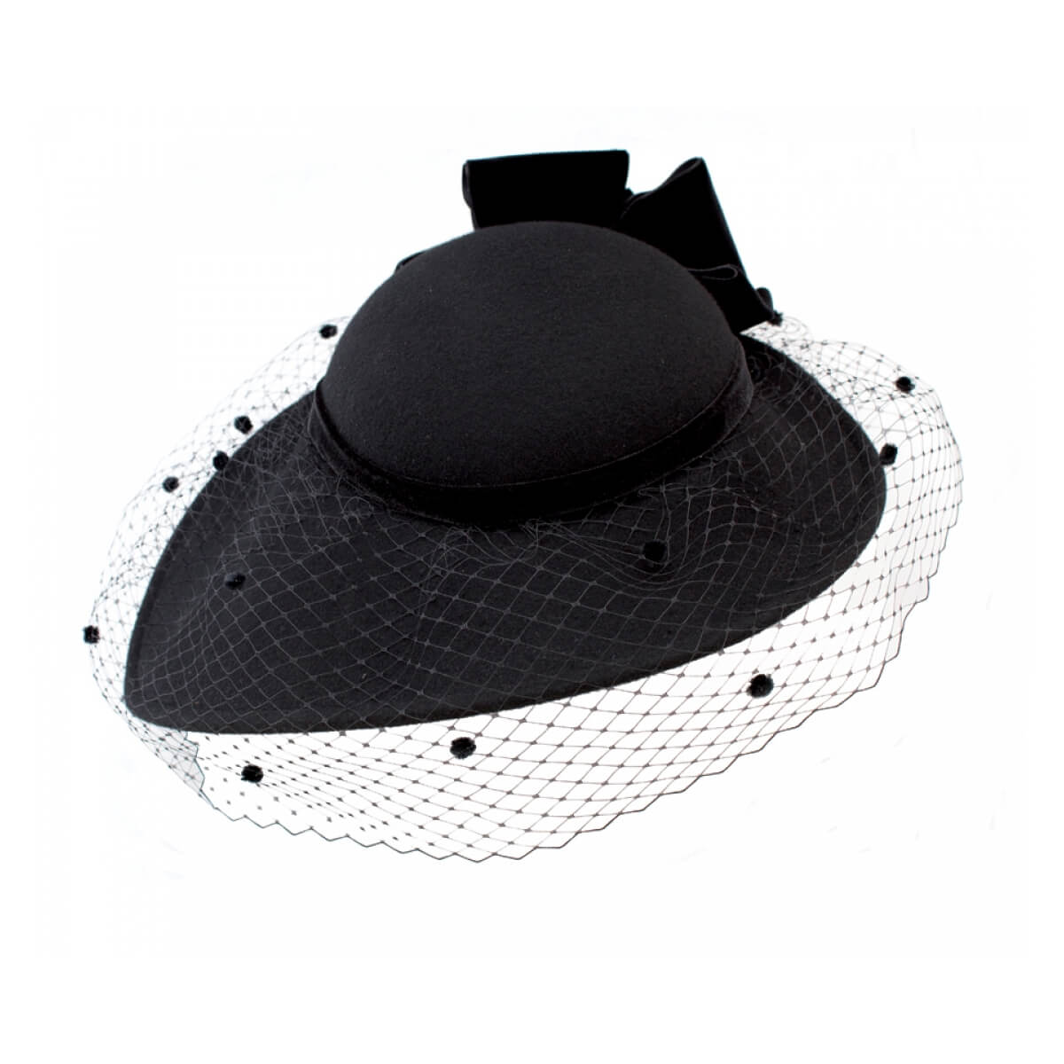 The brim is a profile platter asymmetrical shape that angles to one side creating a dramatic effect. The low crown rests on the top of the head and the elastic strap is worn around the back to keep hat in securely in place. A lovely poly velvet band surrounds the crown and has a folded plush bow at the back. The hat is finished with chenille dot veiling that drapes around the brim.