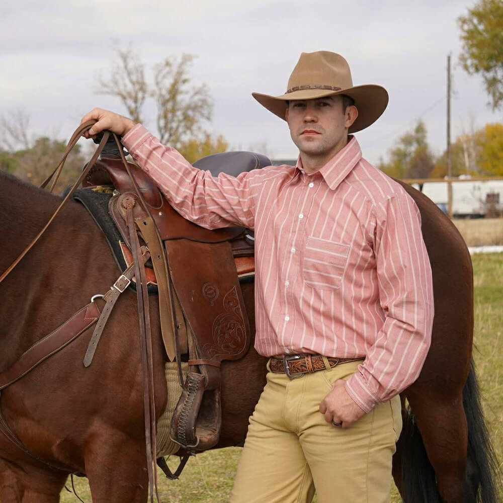 Go for a western shirt with a yoke in the back, button down front, left chest pocket and feel like the leading man, not an extra in a John Wayne movie. Made of fine 100% cotton in three complimenting stripe colors. Made in USA.