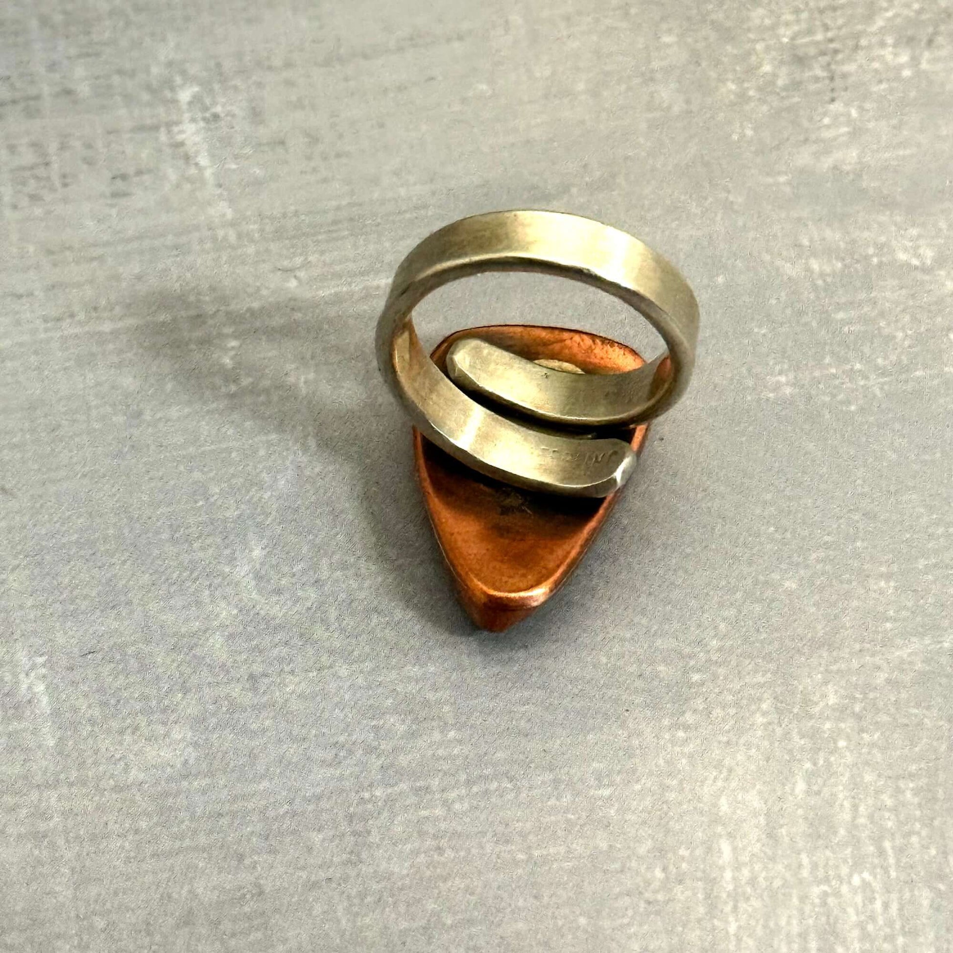 Handmade J Marie Genuine Turquoise Ring with adjustable band and unique copper base design.