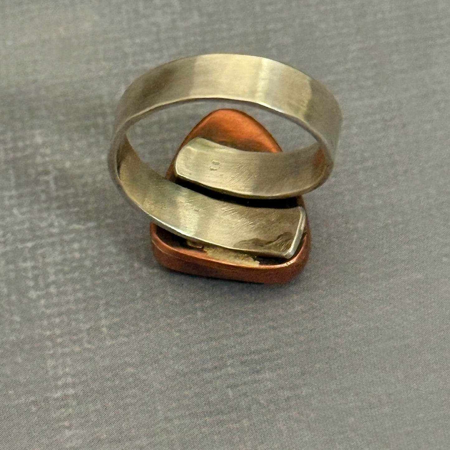 Handmade J Marie Genuine Turquoise Ring with adjustable band, featuring unique turquoise pattern and vibrant color.