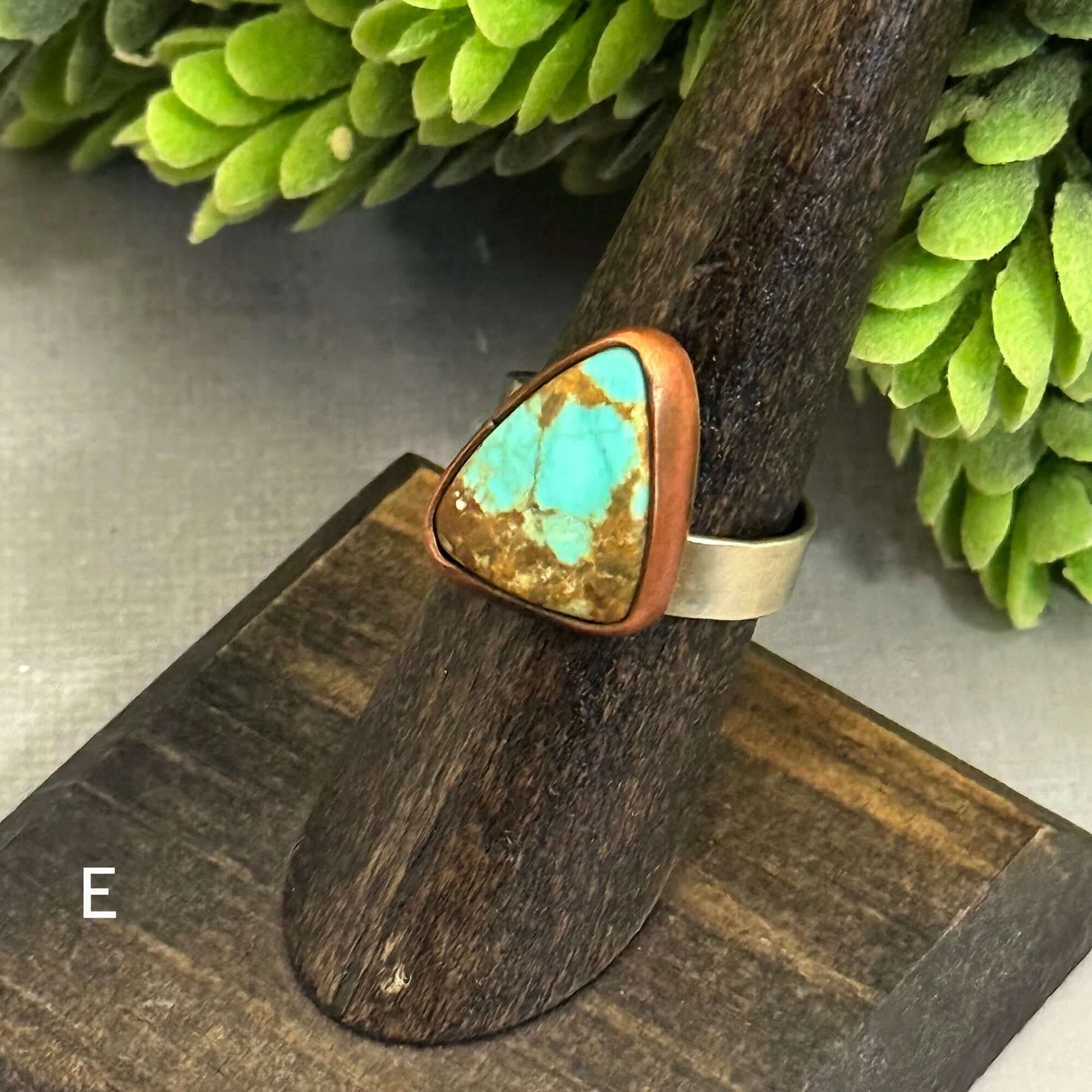 J Marie Genuine Turquoise Ring featuring a unique triangular turquoise stone on an adjustable band.