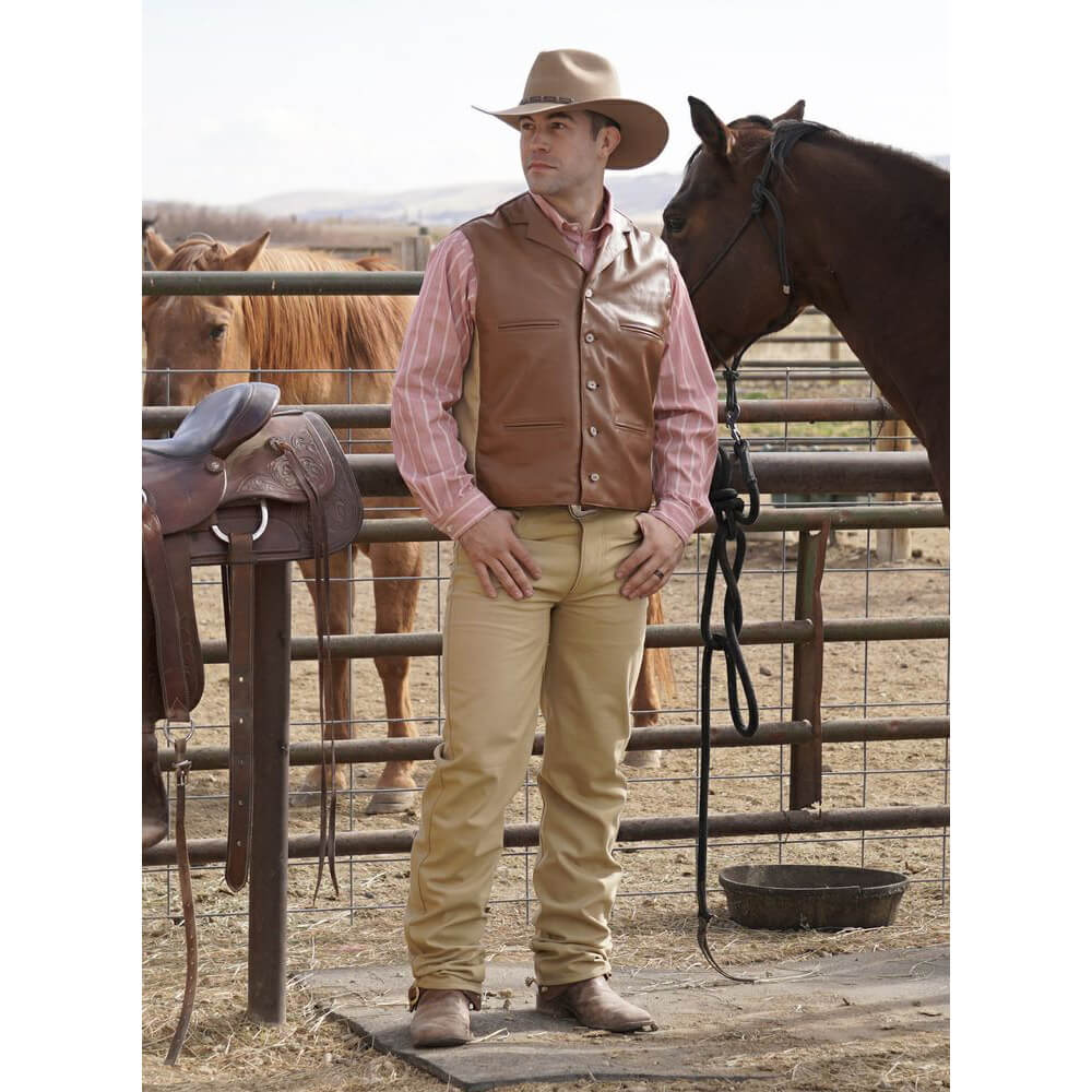 This classic style vest is inspired by the original “Duke Vest” that was made popular by John Wayne. The vest is made of quality leather in the front, back yoke and back adjustable belt and a canvas back. Designed for rugged good looks and classic western style. This handsome vest features a notched lapel, four welt pockets and finished with 5 antler buttons. What a terrific way to honor the Duke and look great at the same time! Made in the USA.