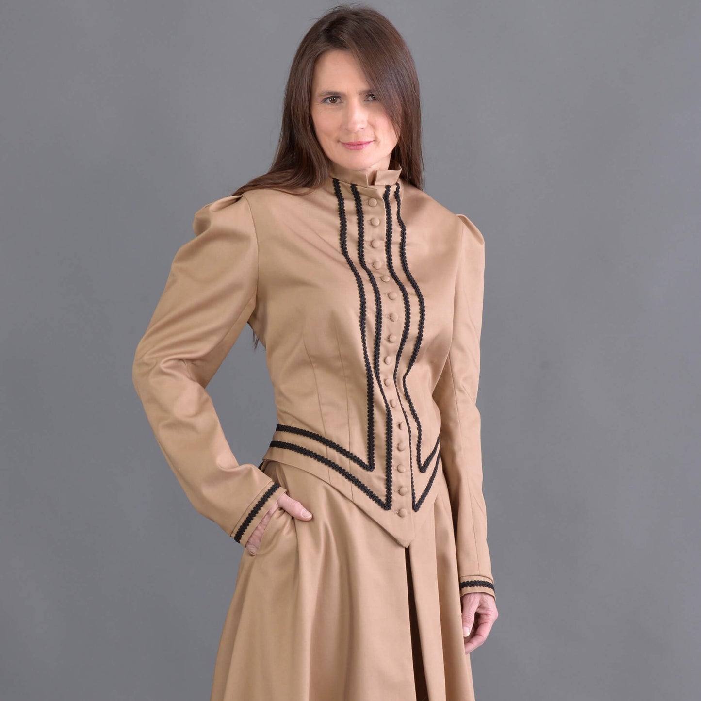 Designed for the horsewoman, this classically tailored Riding Jacket looks handsome with or without the horse. The jacket is very fitted with soutache trim and fabric covered buttons. This jacket and our riding skirt together makes a wonderful combination of tailored fit and comfort so if you ride a horse or just want to look like you do, this is the outfit. 