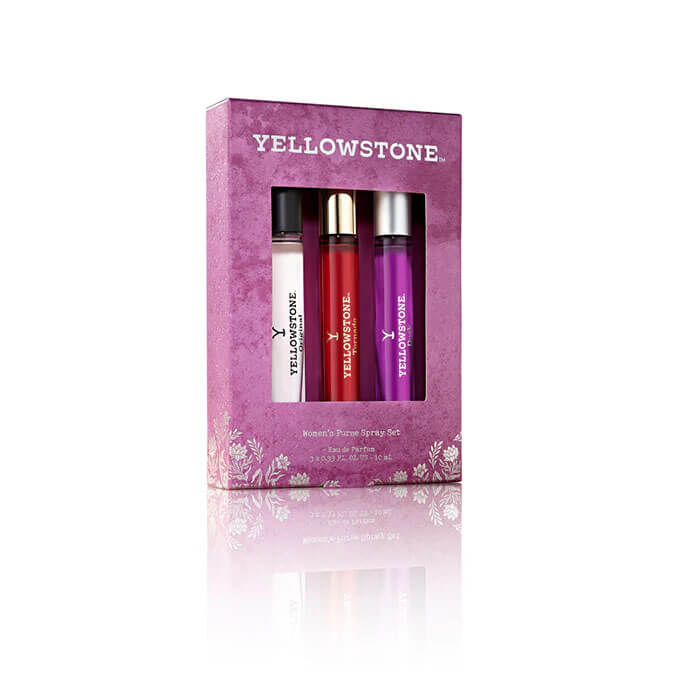 Three Yellowstone perfume bottles in a decorative box on a white background