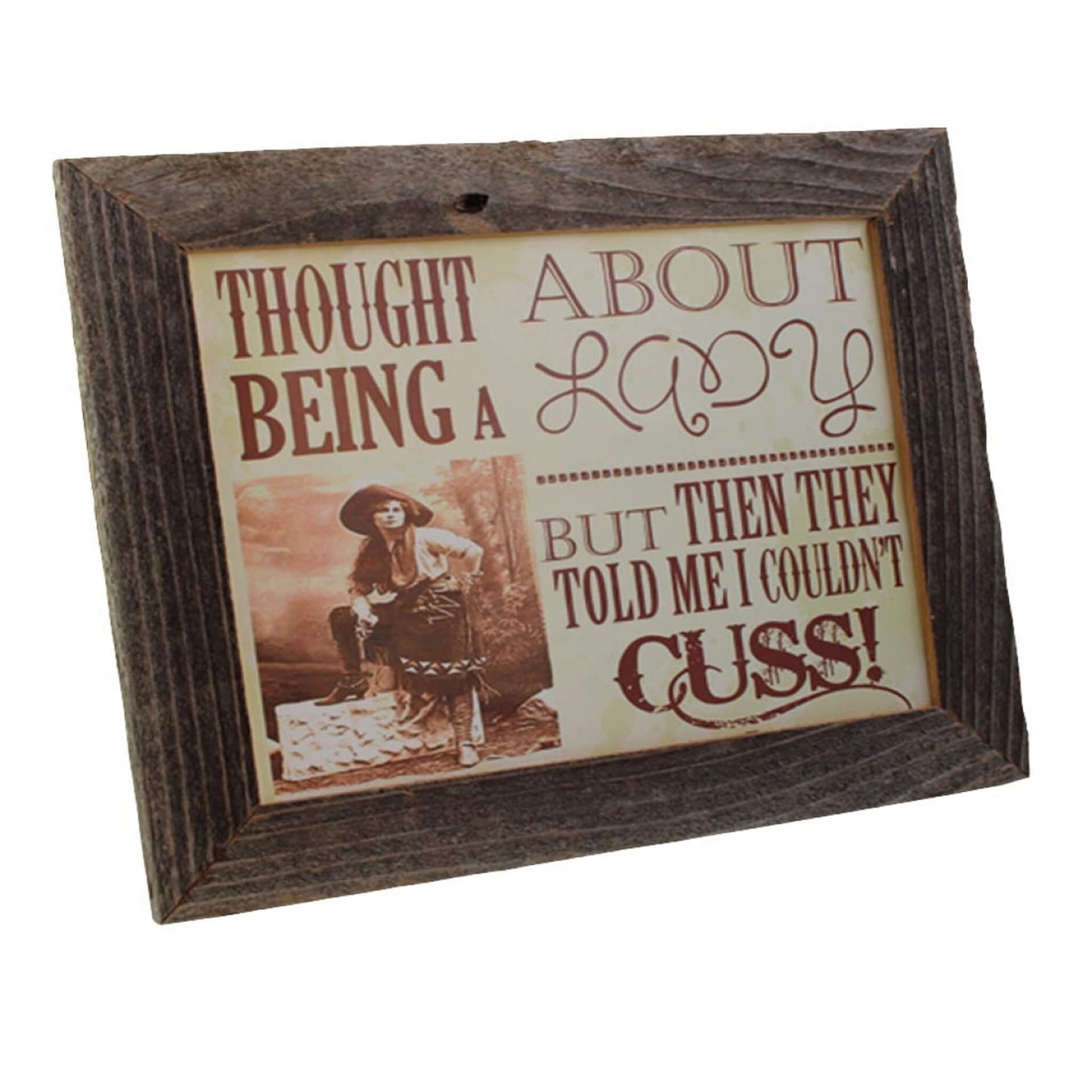 Rustic re-purposed barn wood that is aged and weathered for a perfect frame around a vintage cowgirl print that reads "Thought about being a lady but then they told me I couldn't cuss". Flat edge frame measures 1-1/2" with 8"x10" opening. Made in USA.