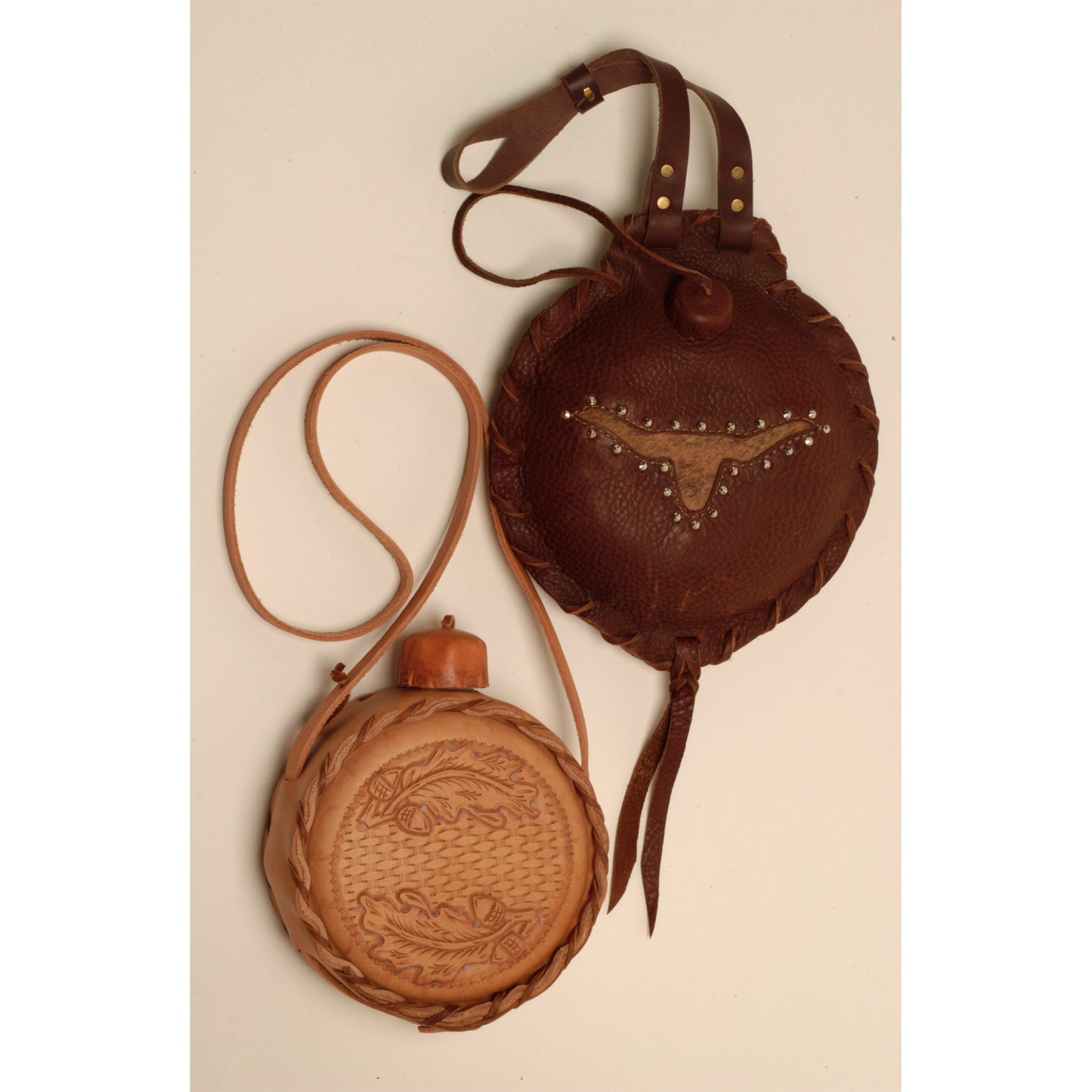 Hand made in Mariposa, California these two-quart canteens are made with a plastic inner core to prevent rusting and covered in top quality leather. Before your next trail ride, make sure you have one of these hanging from your saddle.