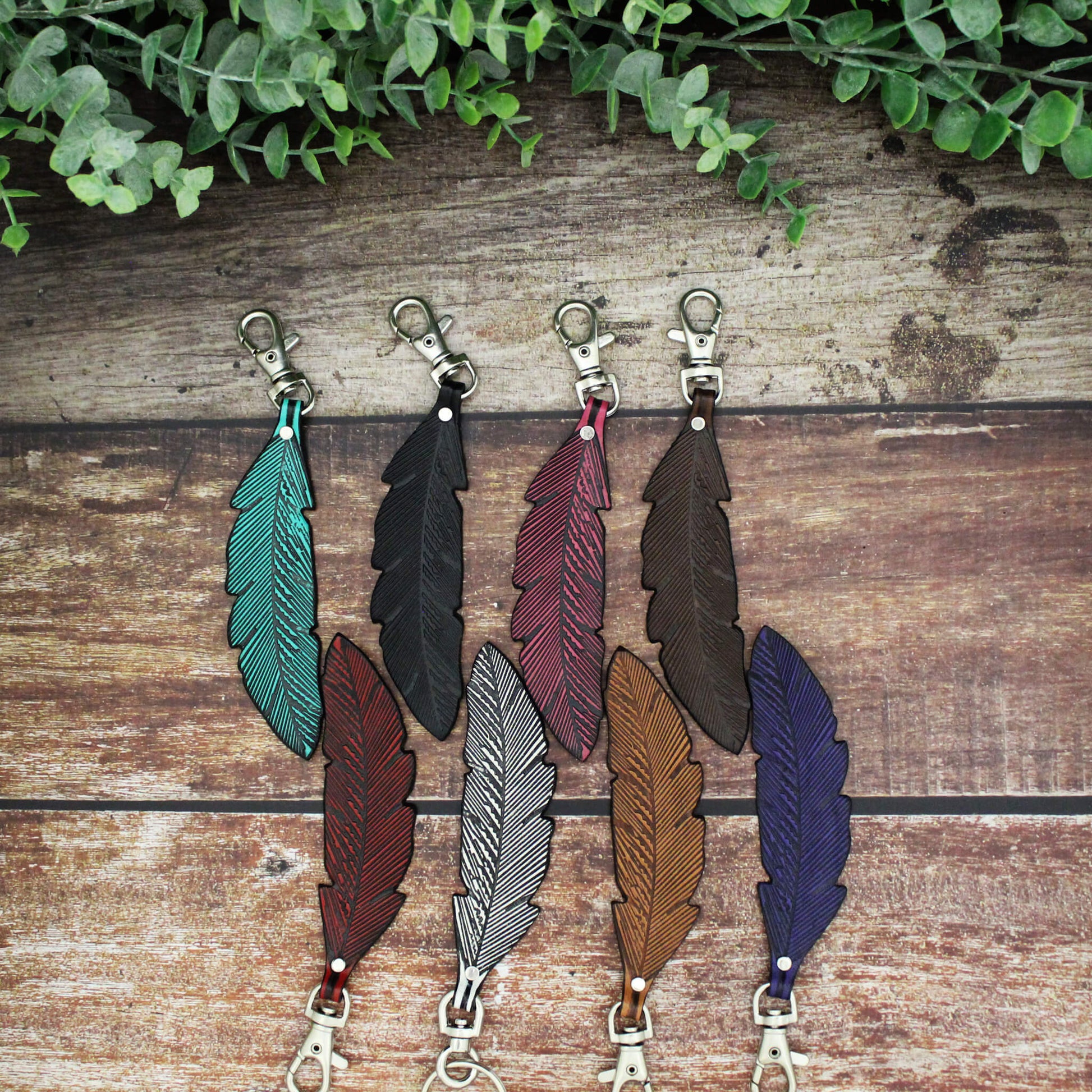 These feather clips are perfect accessories to add to your keys, purse or anywhere you can clip it. Decorate with the perfect accessory! Get one for you and a friend or your whole friend group! Measures almost 6" in total length and 1" at widest part.