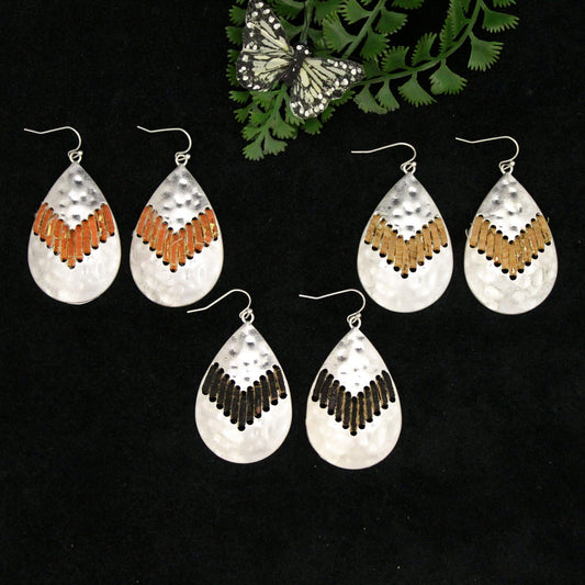 Show off your western flair with these earrings. The handmade leather lace brings a rustic elegance, while the hammered silver earring pairs perfectly for a modern cowgirl look. Measure 1-1/4" by 2". Imported.