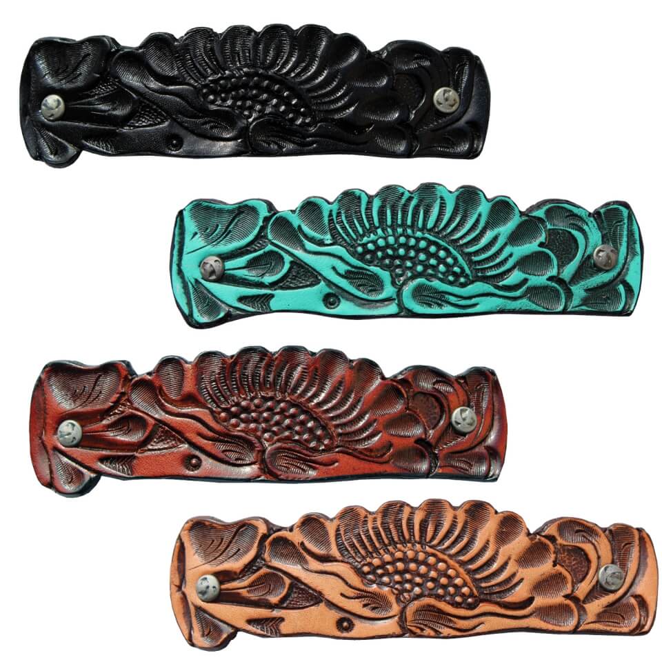 These leather barrettes are embossed with a floral design to create the perfect finishing touch to an effortless hairstyle. Choose from black, brown, turquoise and tan or get all four so you have one for every outfit. Measures 4-½” Long by 1-¼” Wide.