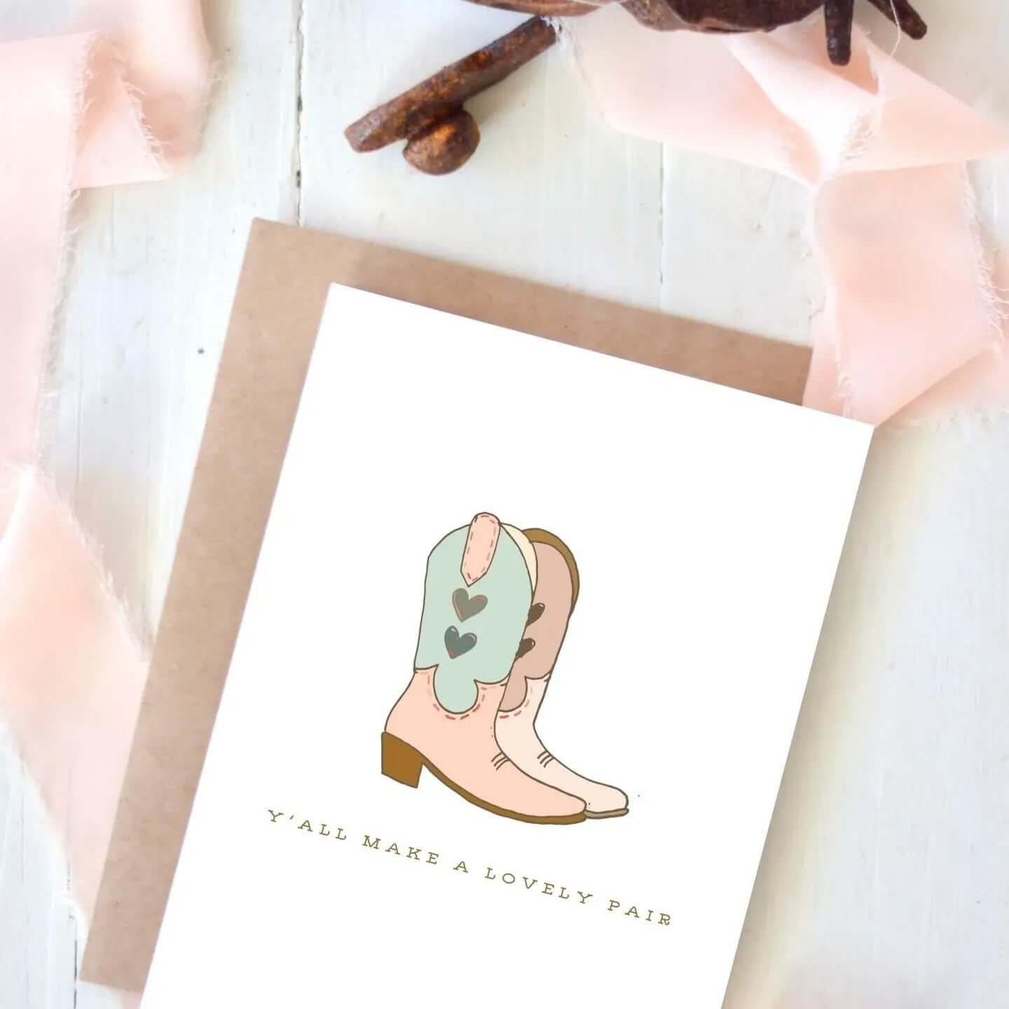 Cowgirl & Cowboy Western Greeting Cards Blank featuring pink boots with hearts, designed by Tirzah Lane.