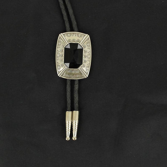 This Bolo tie has a silver rectangle engraved with detail and a black centered stone.  This handsome bolo tie is a great addition that will go with many different attires. 