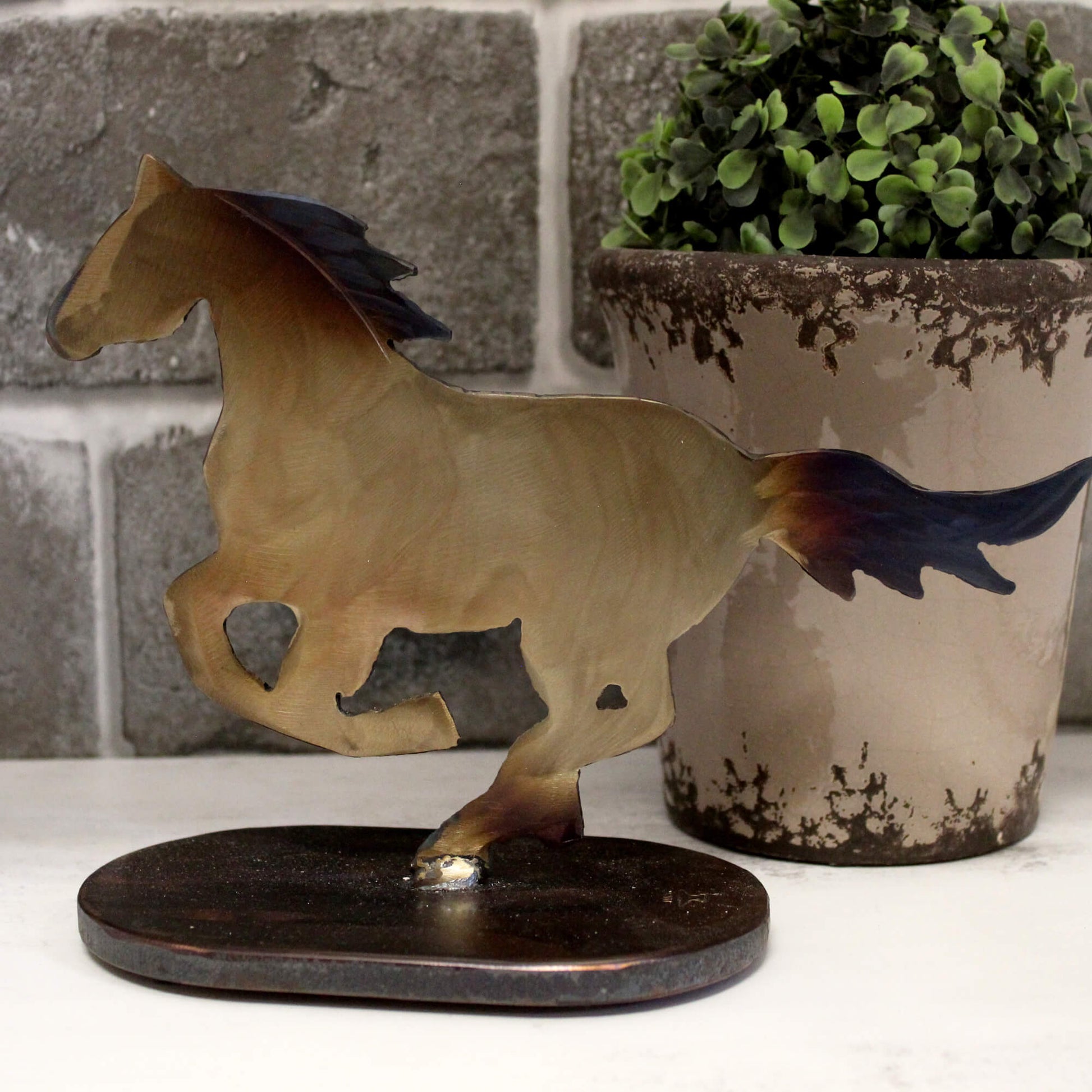 The Metal Running Horse is a must-have for horse enthusiasts, ranchers, and anyone who wants to add a touch of the old west to their home or office décor. This conversation--starting sculpture makes a fantastic housewarming or holiday gift! 