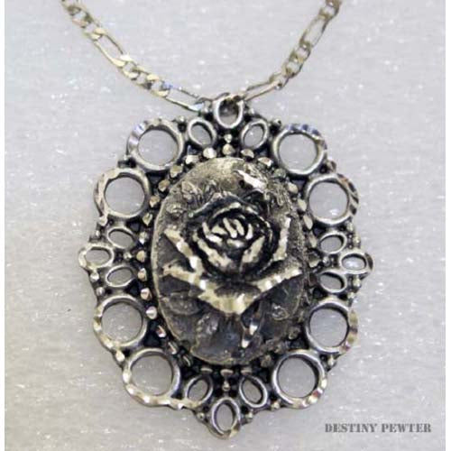 This vintage looking necklace is a classic piece that is great for modern day wear or could compliment a vintage costume or style. Destiny pewter jewelry are made of fine jeweler's pewter that is extremely lightweight and has a brilliant shine. each piece is handmade and hand finished with diamond cuts. The sparkly cuts give each piece a unique dazzling sparkle. Approximately 2" on a 18" chain. Made in USA.