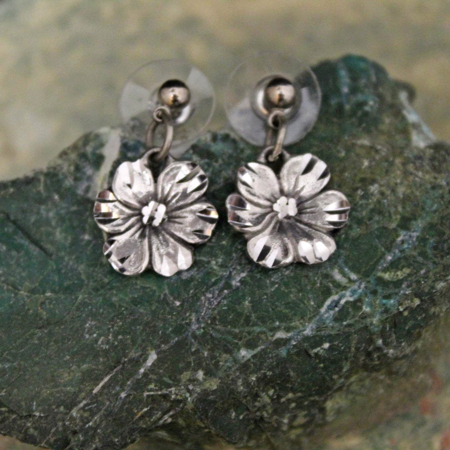 These drop earrings are lightweight and offer long-wearing comfort. Gorgeous Detailing – Handcrafted fashion earrings to represent beautiful pansies. Each piece is handmade and hand finished with diamond cuts. The sparkly cuts give each piece a unique dazzling sparkle. Approximately 1/2" diameter. Made in USA