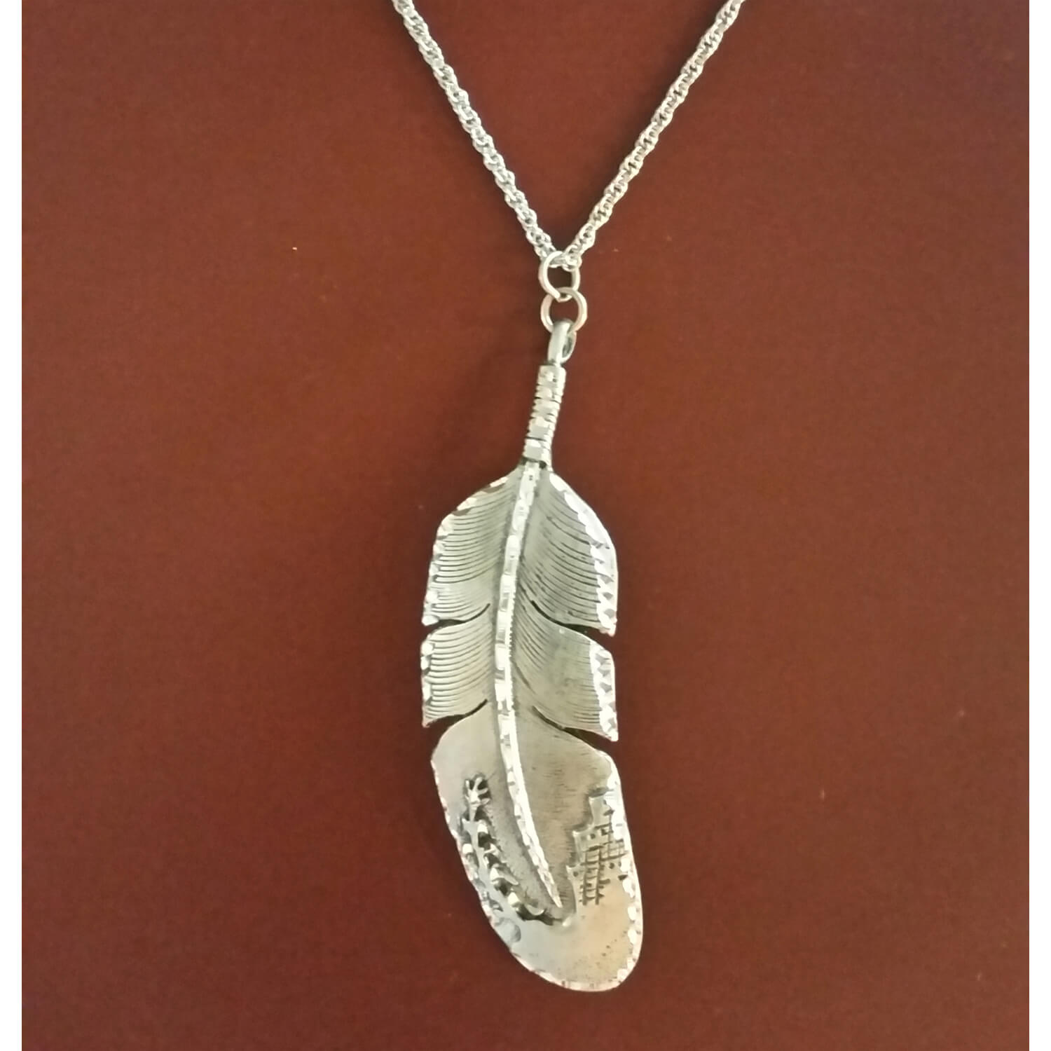 Destiny pewter jewelry are made of fine jeweler's pewter that is extremely lightweight and has a brilliant shine. Each piece is handmade and hand finished with diamond cuts. The sparkly cuts give each piece a unique dazzling sparkle. Feather measures approximately 3" long x 1" wide on an 18" chain. Made in USA