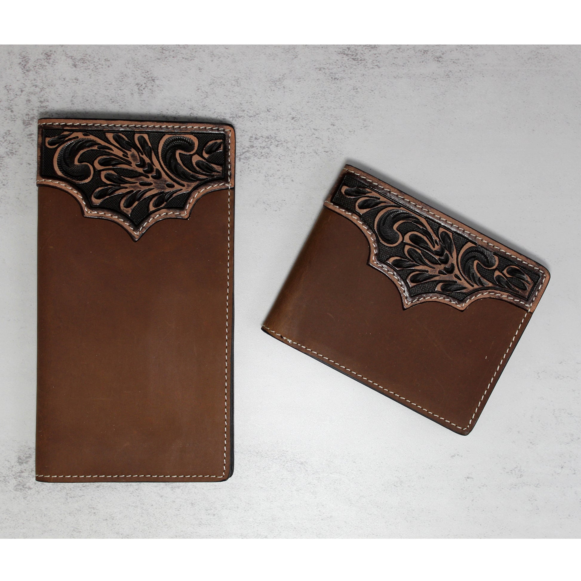 This men's western leather wallet is perfect for any guy. Distress Leather with Floral Tool Sanded Overlay. Choose from the Rodeo Wallet or Bi-Fold. Sold Separately.