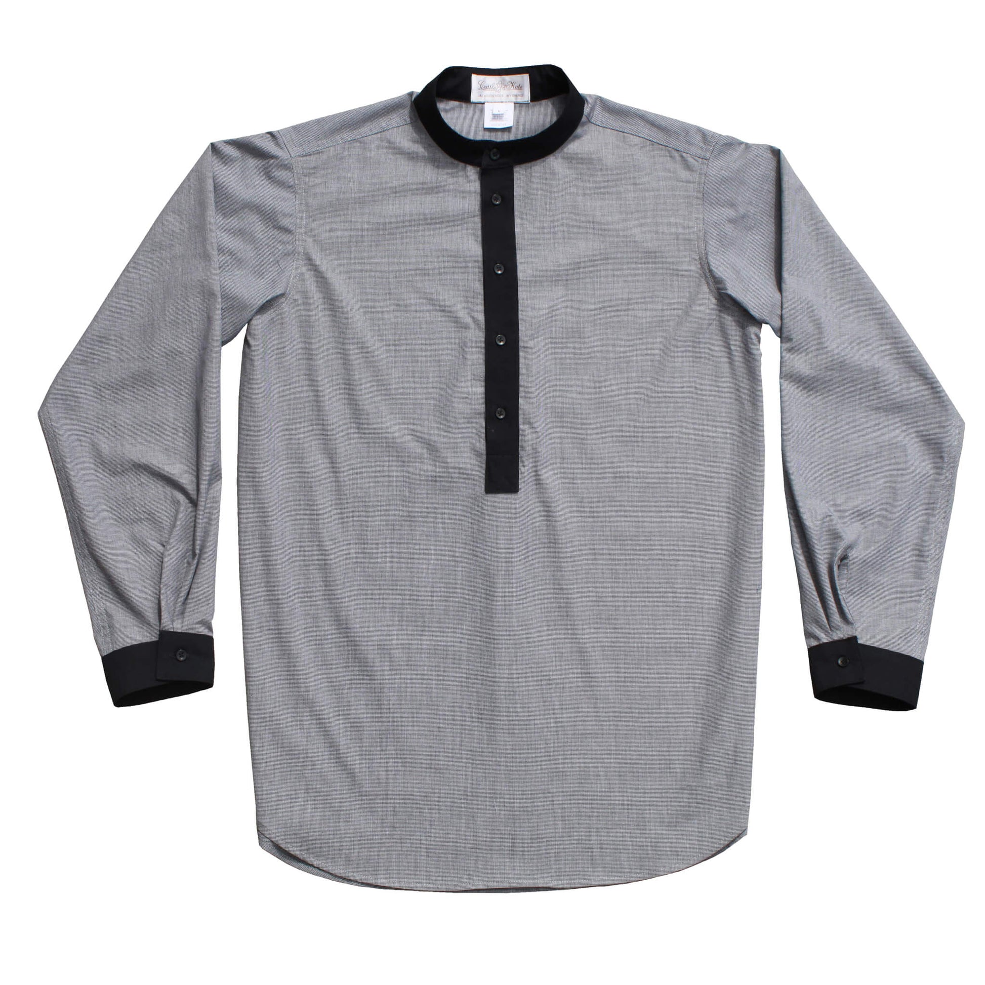 This shirt will offer today’s cowboys a comfortable, cool version of the reminiscent of shirts once worn. Pullover shirt features a button down front placket, cuffs and a band collar in a solid contrast. Perfect for old west re-enactments, pioneer or frontier days or your next trail ride. Layer it with a vest for a different look. 100% Fine Cotton. Made in USA.