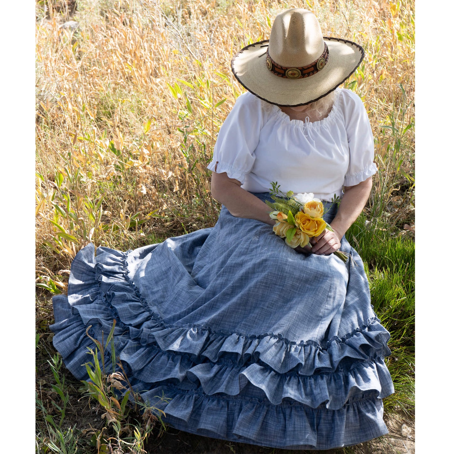 Step back in style! Our Sagebrush Swisher Skirt has lots of fabric for a big swish! Made of eight gores with three layers of fabric at the bottom and an elastic waist in the back make this skirt fun to wear. Comes with two inseam side pockets. Offered in 100% cotton fabric. Made in USA