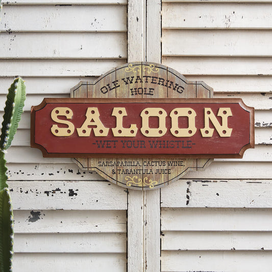 Embrace the spirit of the Old West and make a bold statement with this unique wall sign. It's made of MDF and can hang using its two D-rings on the back. Measurement: 22''W x ¾''D x 13''H