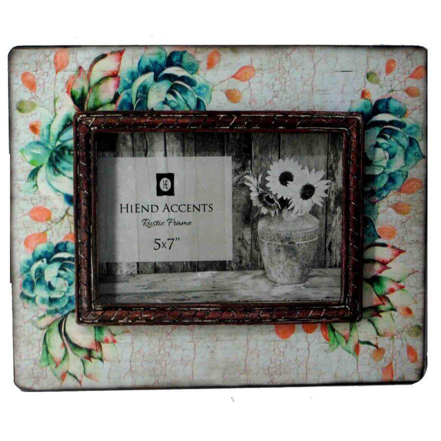 Truly unique, this printed wooden frame gives the appearance that it has been in your family for years. With a hand painted effect of turquoise flowers and peach accents, it is perfect for your eclectic style. For photographs measuring 5" x 7". Can be utilized with either vertical or horizontal photographs. Back has swing tabs for easy installation, and a thick layer of glass protects your image.