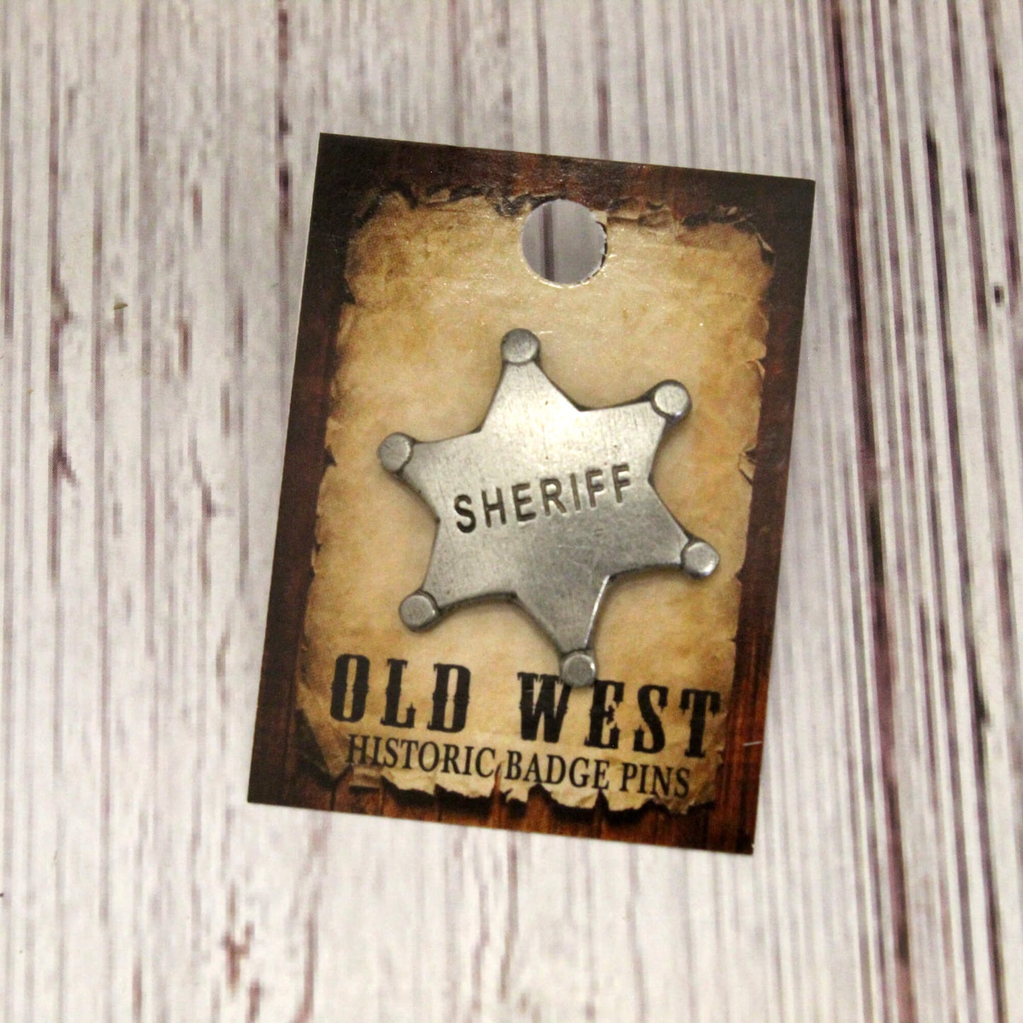 Sheriff badge pin on a 'Old West Historic Badge Pins' card with a rustic background.