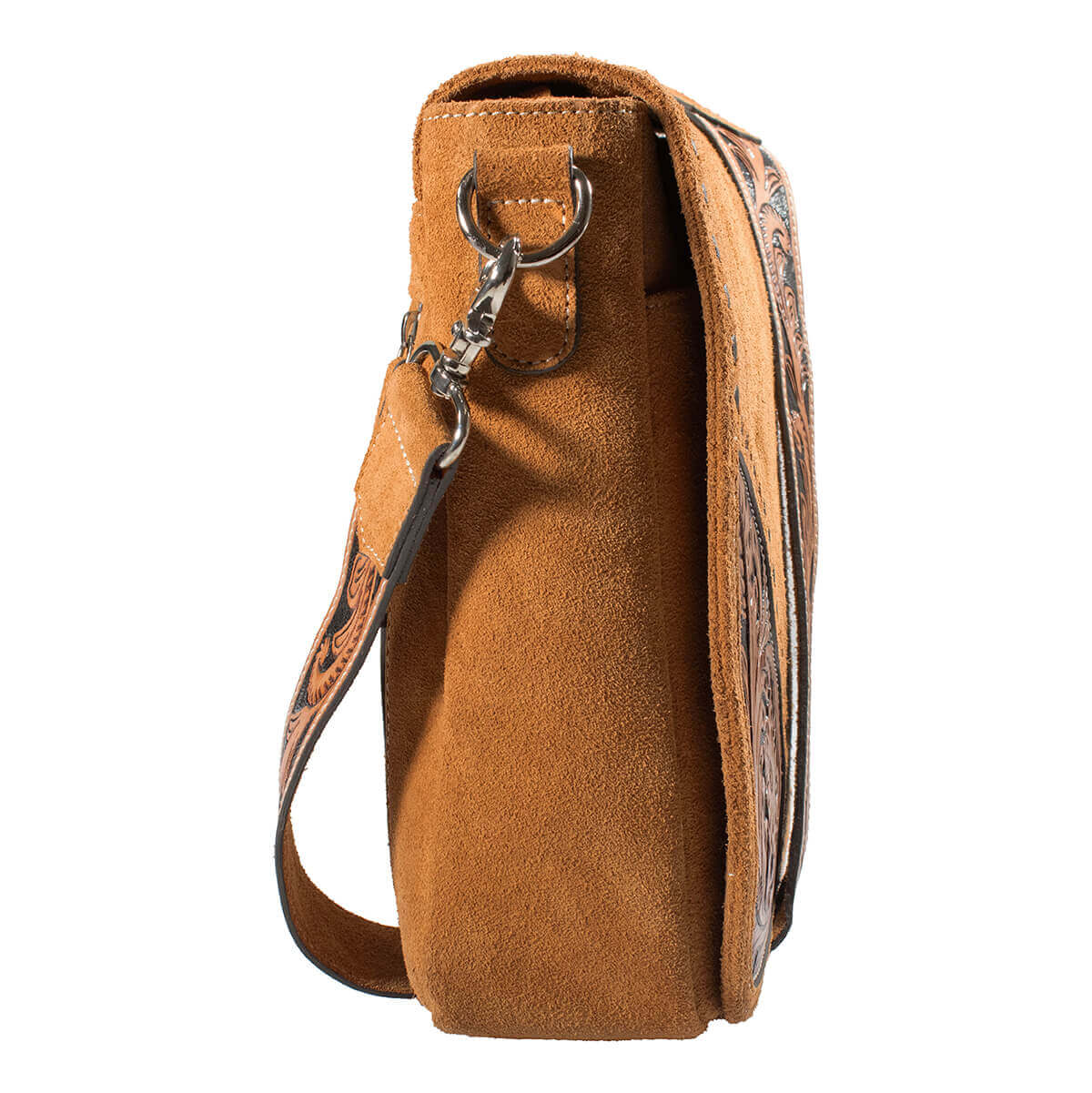 Brown leather bag with decorative strap on a white background