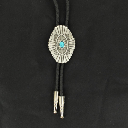 Get into the Western mood with the authentic look of the Bolo Tie. This bolo features an art deco style concho with an oval turquoise stone in the center. Black braided strings with silver tips. 1-1/2" wide by 2" tall.