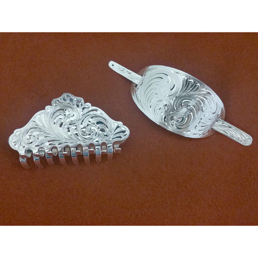 Use one of these beautiful German Silver plated Hair Acccesories to accent your up do! Classy and stylish, these are the perfect accent to dress up your hair. Choose from the hair clip (3-1/2"L X 2"H) or the Hair Stick (4"L X 2"W).