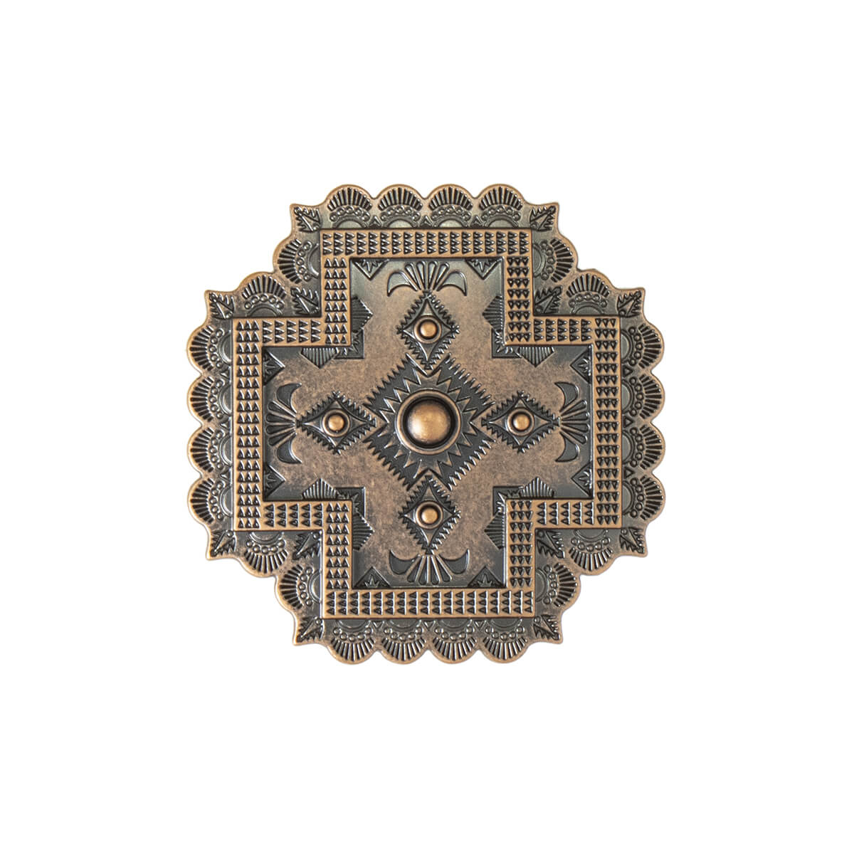 Cross shaped buckle with a southwest pattern in the center and a bronze cross. Scalloped edges have engraved sunbursts. Antique bronze finish. Measures 2-3/4 x 2-3/4