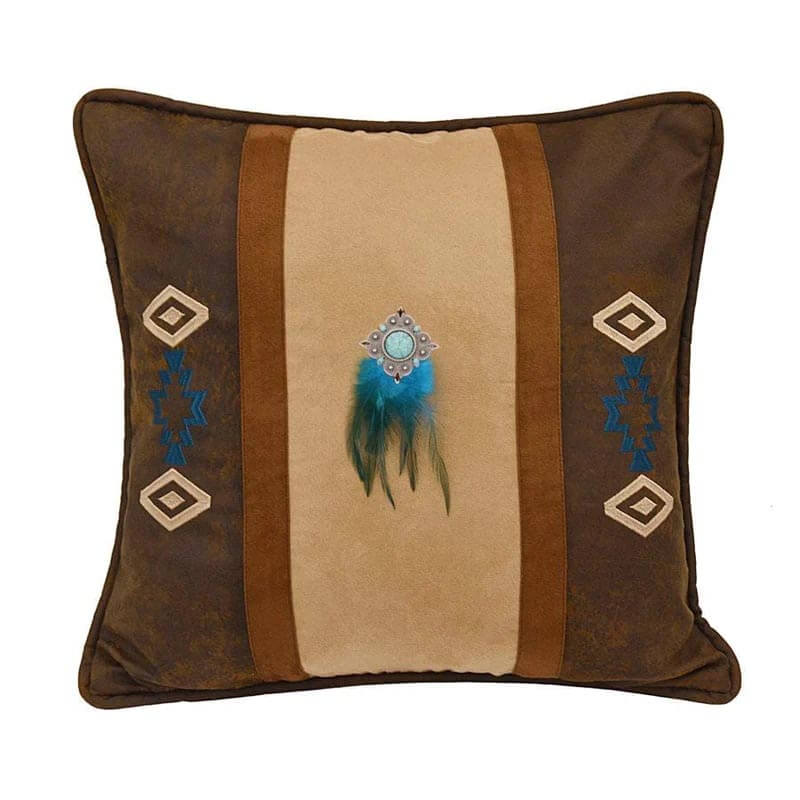 Inspired by the vibrancy of Southwestern designs, this decorative pillow brings a distinct Southwestern charm to your home. In the center is a vibrant faux turquoise medallion adorned with multicolored feathers, which sits atop a rich tan faux suede panel. Copper faux suede and chocolate faux leather trims line the edges and play host to embroidered geometric patterns. Finished with self-piping, this accent pillow is designed to complement our range of Western and Southwestern collections.