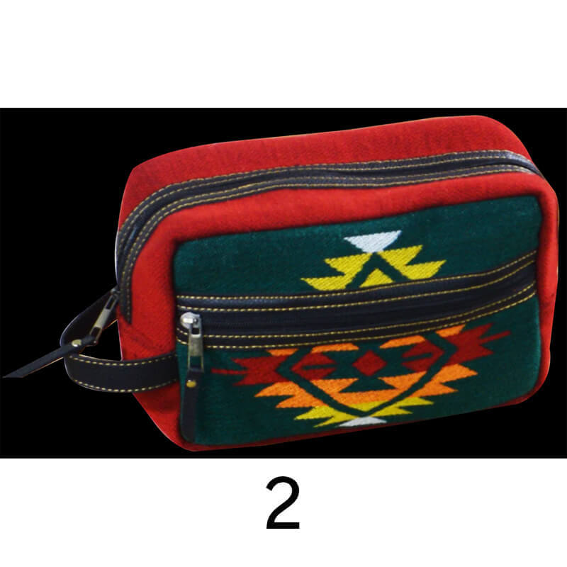 Red and green pouch with tribal patterns on a white background