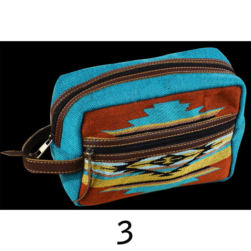 Blue toiletry bag with tribal pattern on a black background