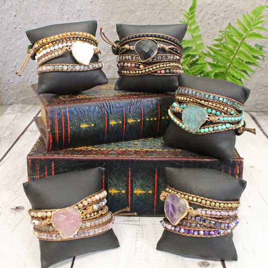 Experience the authentic charm of these 5-Strand Heart Wrap Bracelets. Handmade with love, these variety of colors bracelets feature natural stones that add a touch of earthy elegance to your style. The adjustable design ensures a comfortable fit for everyone. Crafted from real leather and cowhide. Add a unique touch to your jewelry collection. Enjoy the beauty of these bracelets.