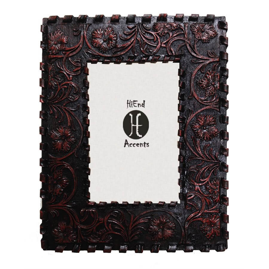 Tooled faux leather and a laced edge design create a timeless look for this photo frame. Available for photos in 4 X 6 inches. Can be utilized with either vertical or horizontal photographs. Back has swing tabs for easy installation, and a thick layer of glass protects your image. Measures approximately 9" X 7