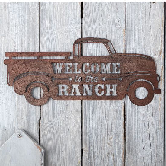 <span data-mce-fragment="1">Antique brown finished laser cut metal in the shape of a vintage pickup with the welcoming sentiment inscribed into the side. Hangers on the back for easy installation to any flat, vertical surface.</span><br>