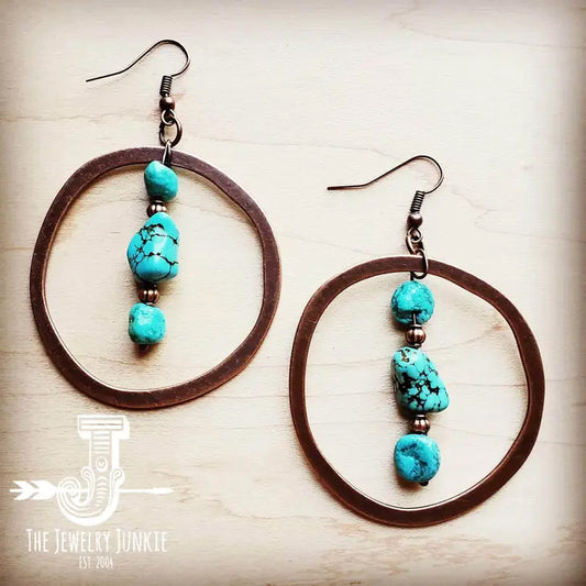 Copper hoop feature chunks of turquoise and copper. They are the perfect complement to your boho style! The entire length is approx. 2". Although your item will resemble the photo, each piece is created by hand, so no two are identical.