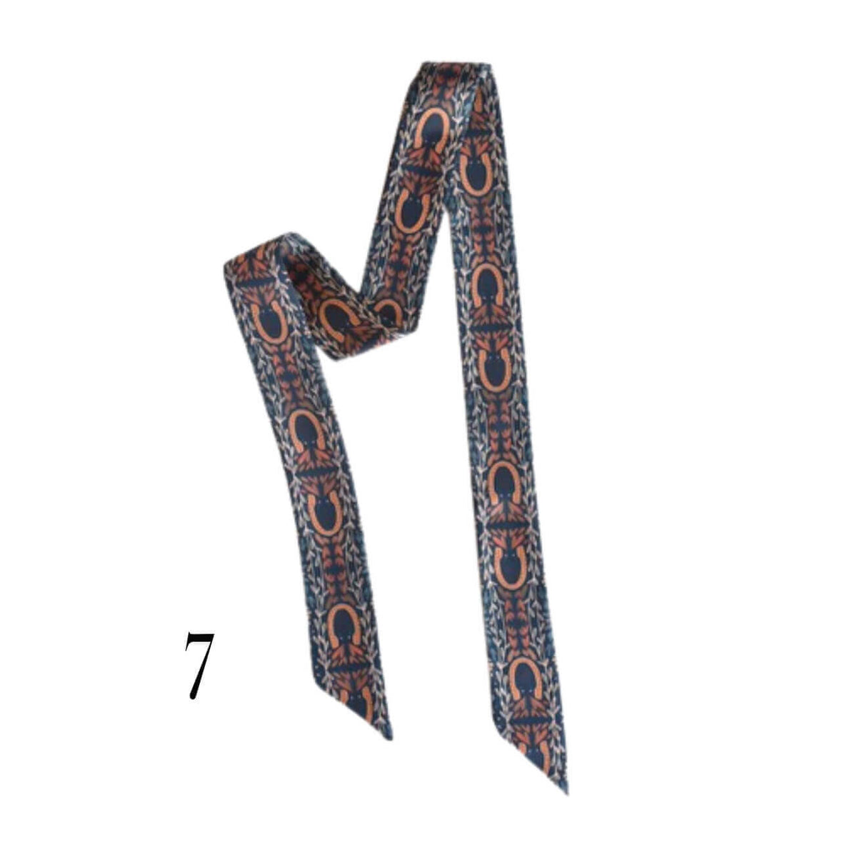 A patterned twilly scarf with a repeating horseshoe motif in rust orange and navy blue on a white base, shown on a plain white background with the number 7 in the lower-left corner.