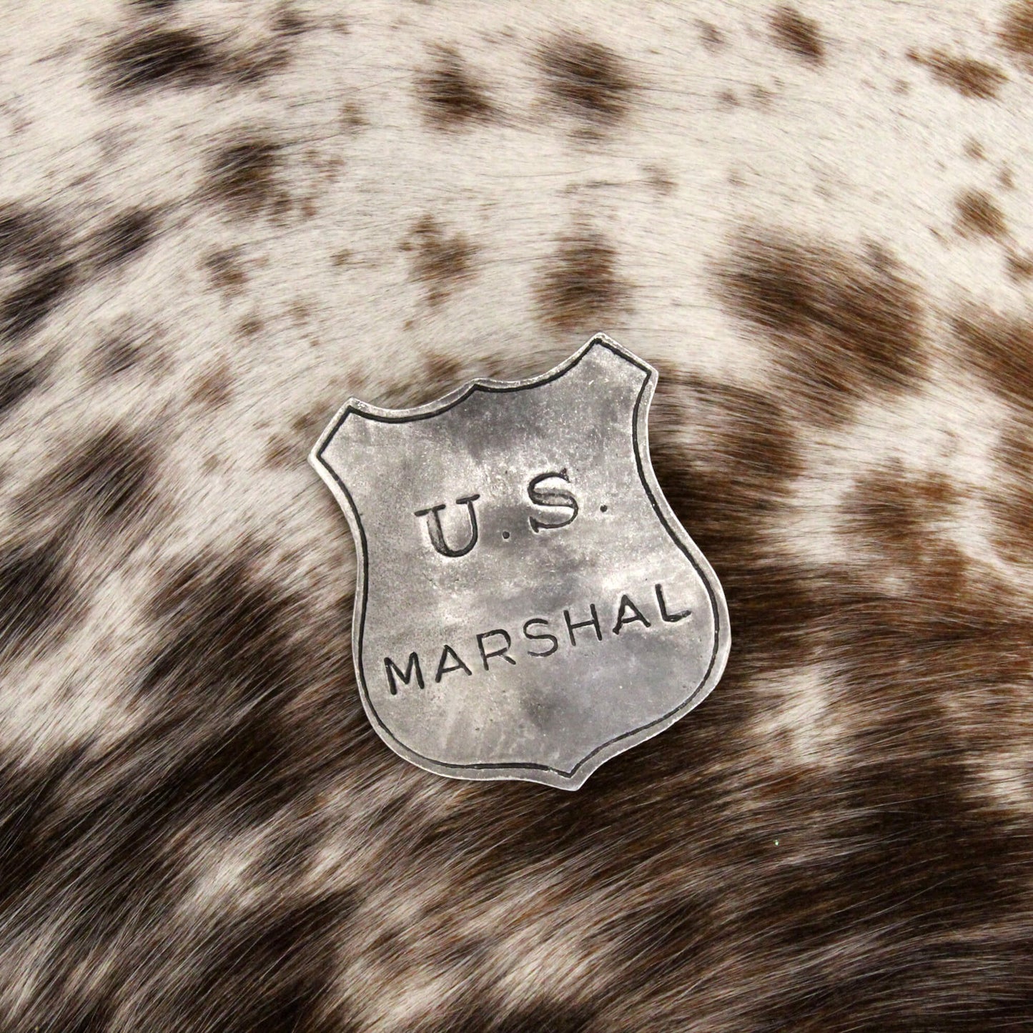 Boldly take on the Wild West with the US Marshal Western Badge. This authentic-looking badge demands respect and authority.