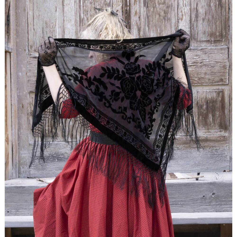 Triangle shaped velvet shawl is made with soft burnout velvet material that is comfortable wearing for any season. Polyester. Imported.