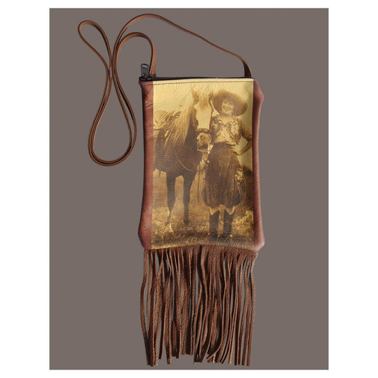 Every Cowgirl needs a cool purse. This bag feature vintage photo of Prairie Rose and horse on soft leather purses with a long strap and fringe. Measures 6”W X 9”L. 