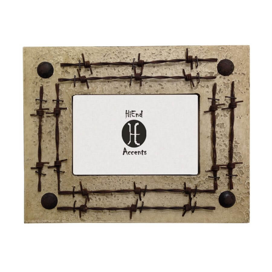 Crafted from high quality resin and designed to appear like distressed wood, this frame has a cream finish with real barbwire accents. This 4" x 6" photo frame will add a western touch to your decor. Available in cream, rust and turquoise colors. Can be utilized with either vertical or horizontal photographs. Back has swing tabs for easy installation, and a thick layer of glass protects your image.