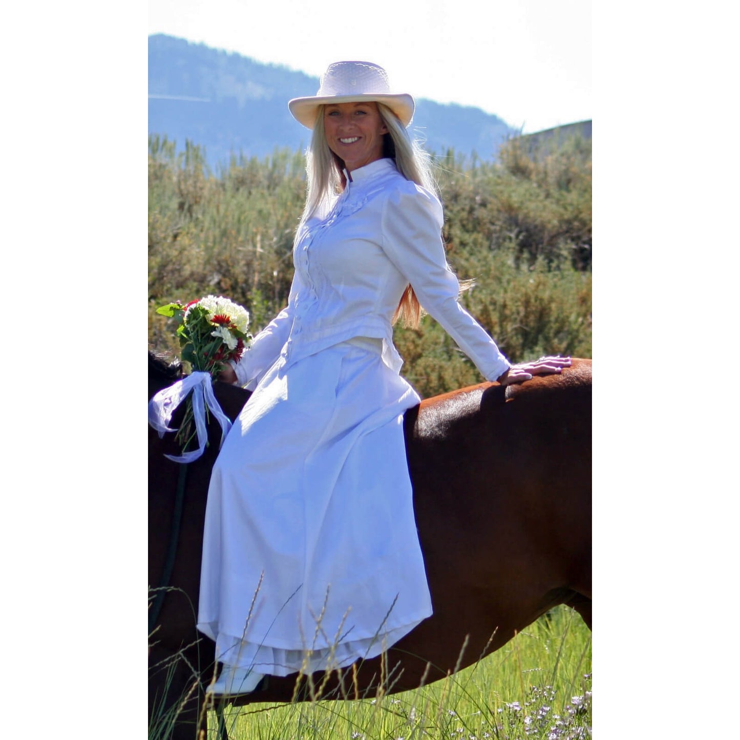 We combined our very popular Riding Skirt and Riding Jacket to complete our Wedding Riding Outfit. Small covered buttons, fitted lines with two rows of rayon braid are featured in the jacket. For saddled woman everywhere on their wedding day. 100% white cotton twill with white rayon braid.